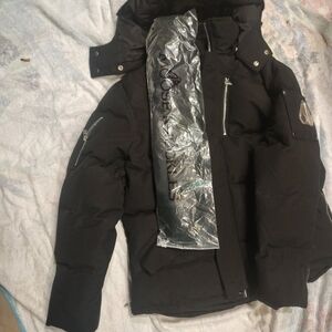 Black Puffer Jacket with Silver Accents